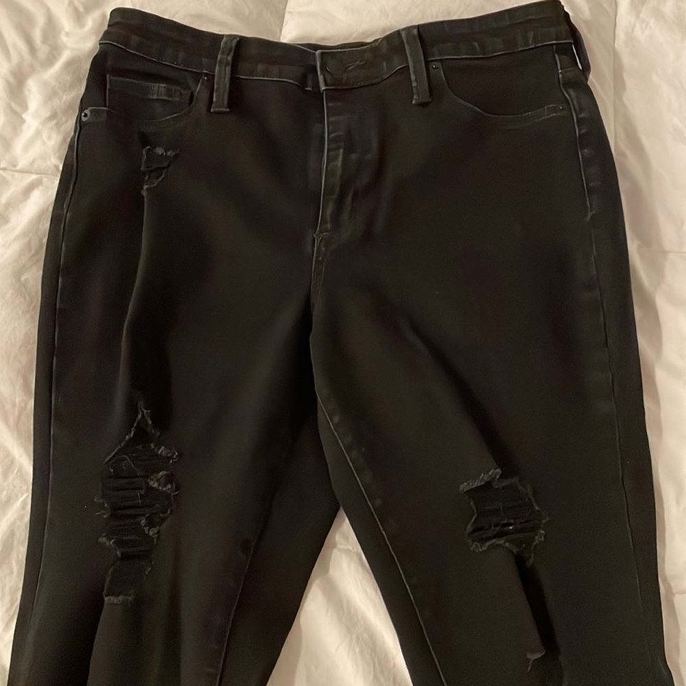 High rise jeggings with ripped detailing. Size 10R. Lots of stretch